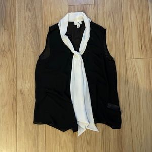 Sheer black blouse with white tie